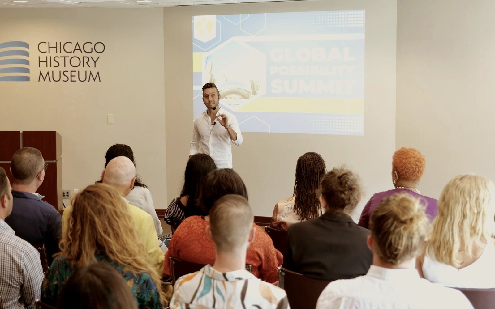 Cal Amir speaking at the Global Possibility Summit, Chicago History Museum
